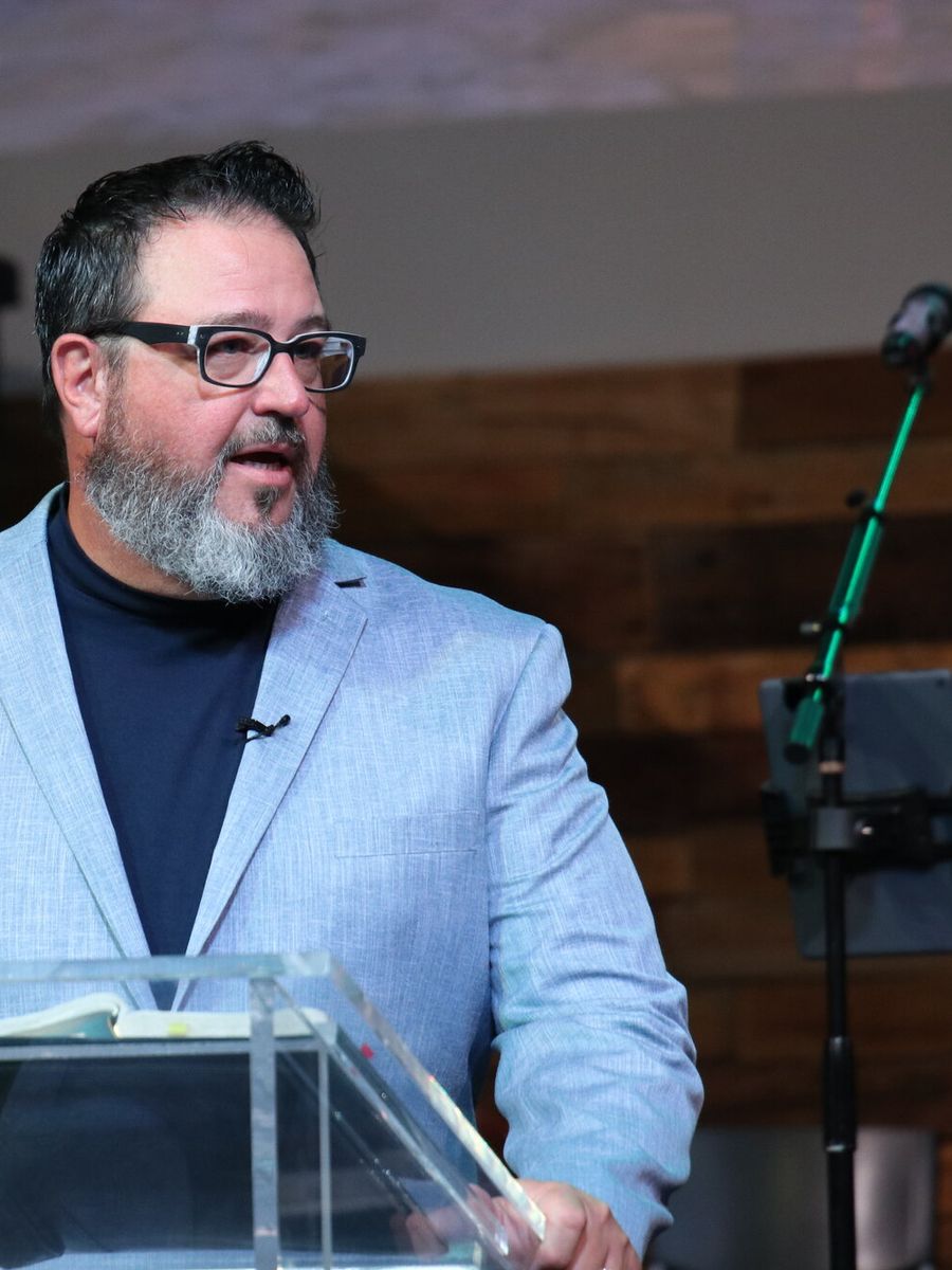 Dr. Chris Holland preaching